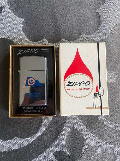 NEVER USED ZIPPO SLIM LIGHTER GENUINE ZIPPO
