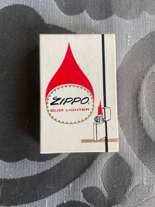 NEVER USED ZIPPO SLIM LIGHTER GENUINE ZIPPO