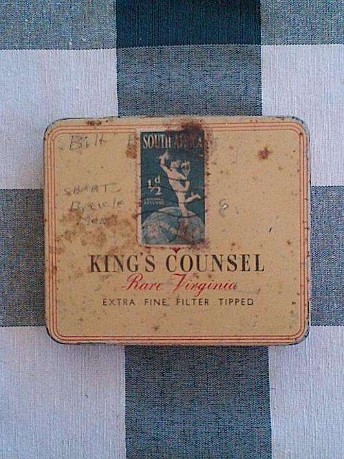 CIGARETTE TIN WITH VINTAGE STAMP: King's Councel 20's tin with old 1/2d SA stamp on it 1949