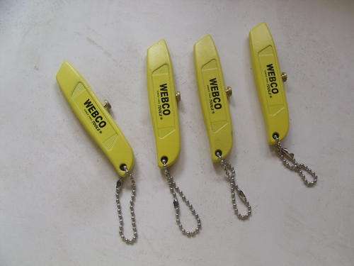 Utility knife key ring lot of four.
