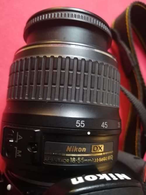 Nikon D5200 with 2 lenses, bag and SD card