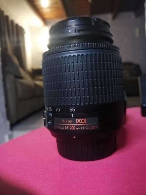 Nikon D5200 with 2 lenses, bag and SD card