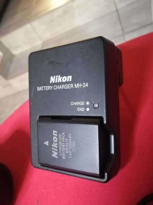 Nikon D5200 with 2 lenses, bag and SD card