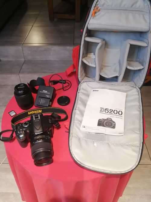 Nikon D5200 with 2 lenses, bag and SD card
