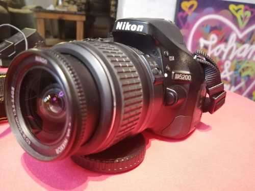 Nikon D5200 with 2 lenses, bag and SD card