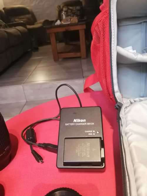 Nikon D5200 with 2 lenses, bag and SD card