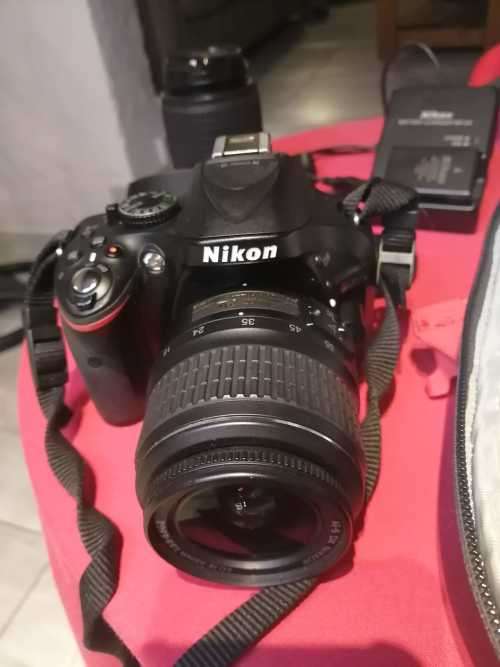 Nikon D5200 with 2 lenses, bag and SD card