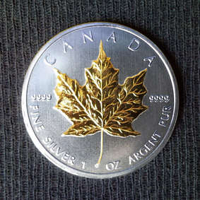 1 oz .9999 Silver Bullion Canadian Maple Leaf + 24ct Gold Layering. INSANE R1 START!