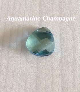 Swarovski 11x10mm Briolette Pendant in Aquamarine Champagne