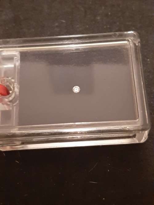 Diamond..0.06ct Sealed in Box ( see Photos) E12