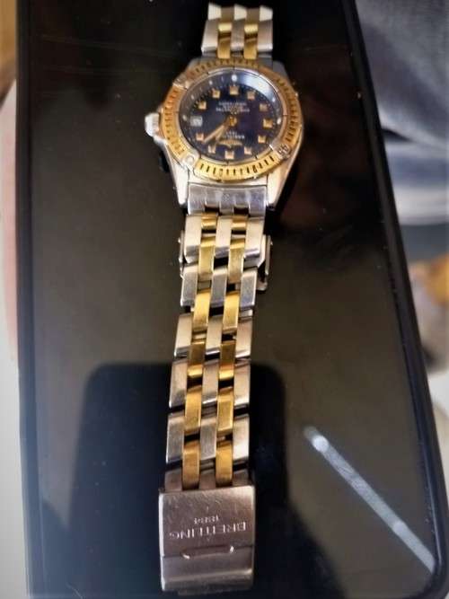 GENUINE` 18 CARAT GOLD` BREITLING Ladies Watch. (Damaged)