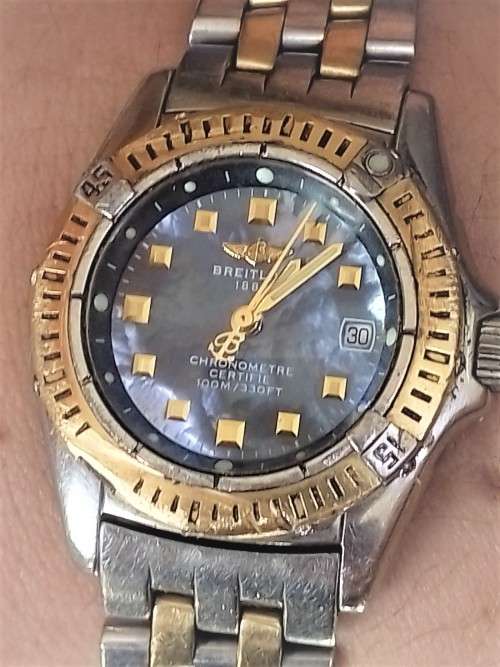 GENUINE` 18 CARAT GOLD` BREITLING Ladies Watch. (Damaged)