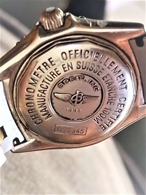 GENUINE` 18 CARAT GOLD` BREITLING Ladies Watch. (Damaged)