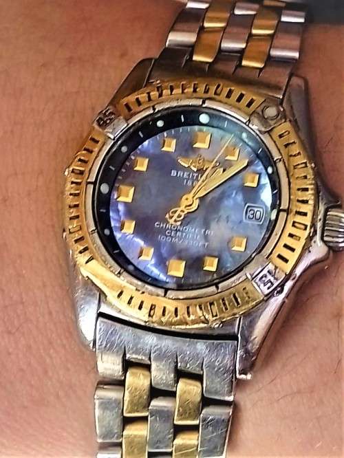 GENUINE` 18 CARAT GOLD` BREITLING Ladies Watch. (Damaged)