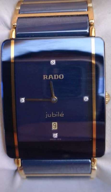VALUED at R22000, ``RADO JUBILE` Titanium Scratchproof GOLD Case and Strap.