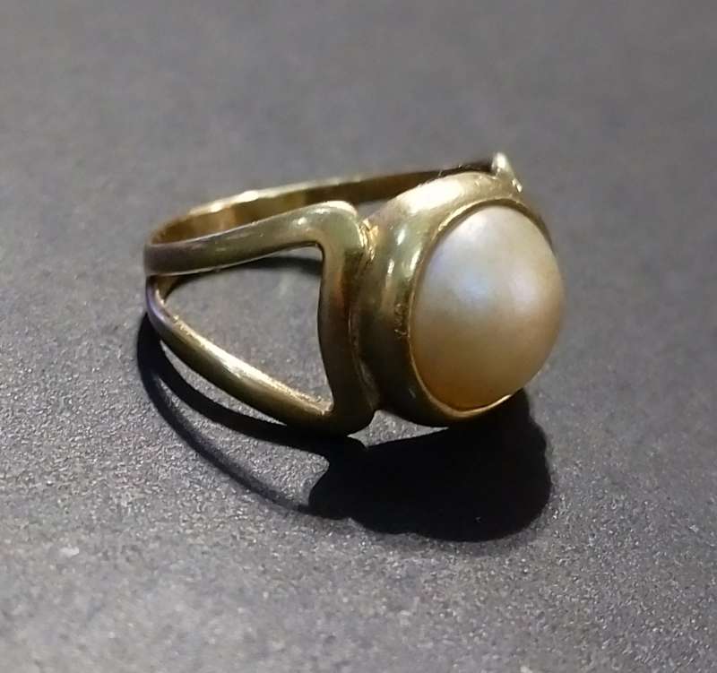 `NATURAL MABI` Set in a 9CT. `SPLIT SHANK` YELLOW GOLD  Ring.