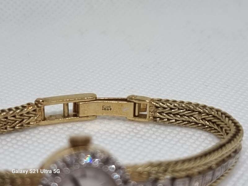 `ONE CARAT DIAMOND` Ladies Watch Set in `14CT YELLOW GOLD` .(Genuine Gold and Natural Diamonds)
