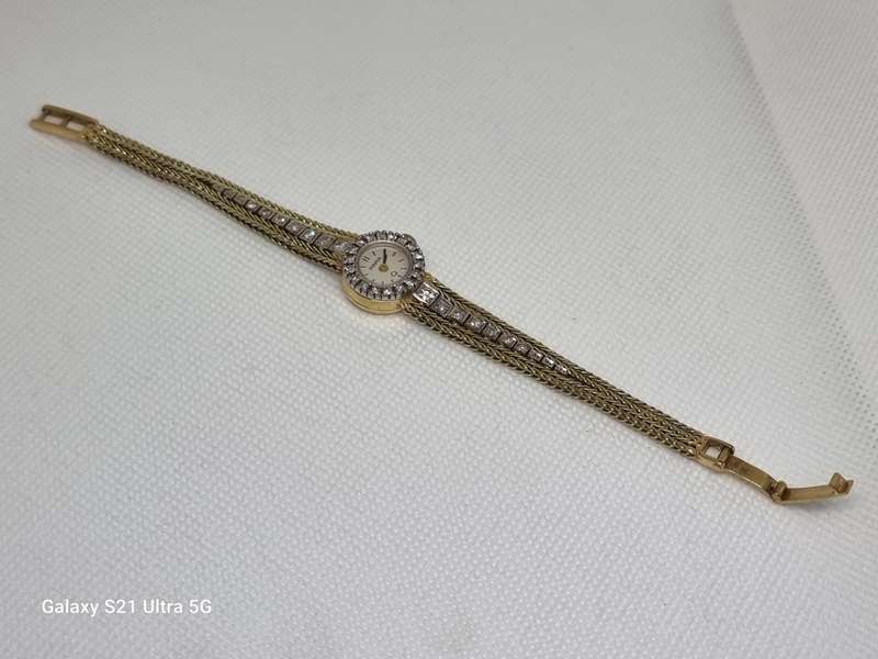 `ONE CARAT DIAMOND` Ladies Watch Set in `14CT YELLOW GOLD` .(Genuine Gold and Natural Diamonds)
