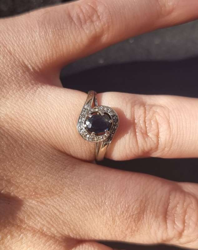 0.75 Carat `" NATURAL CORN FLOUR BLUE SAPPHIRE` Set in 14CT White Gold ( Genuine Gold. )