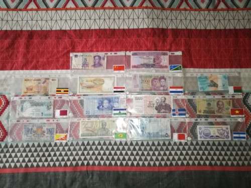 Lot of 70 International Bank Notes