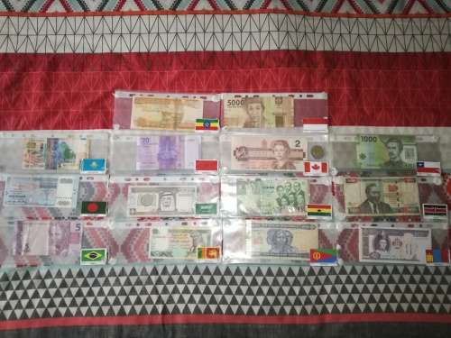 Lot of 70 International Bank Notes