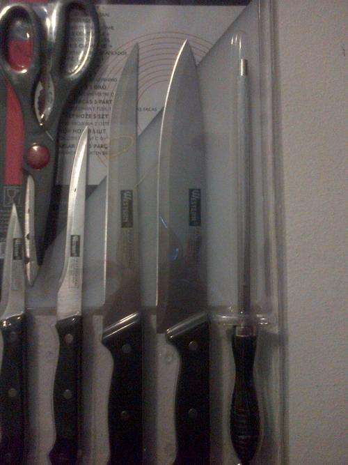 Western designed in Germany  knife set with a sharpner and scissors.