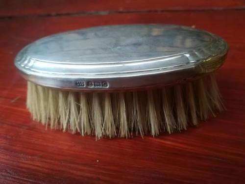 Beautiful antique sterliong silver brush in original box