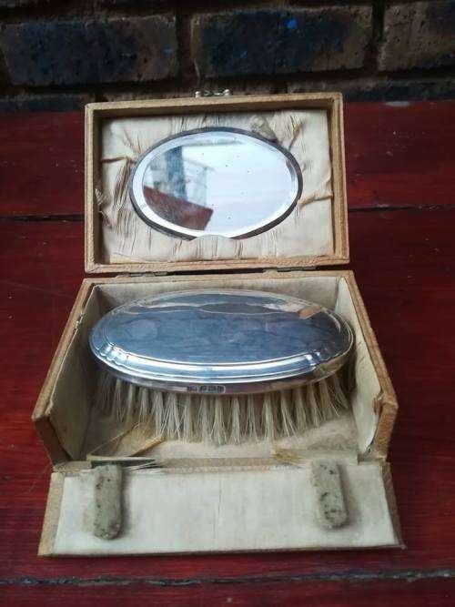 Beautiful antique sterliong silver brush in original box