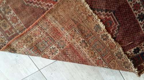 Beautifully lived-in handknotted Persian carpet