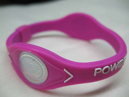 POWER BALANCE SILICONE WRISTBAND PINK WITH WHITE TEXT (XS)