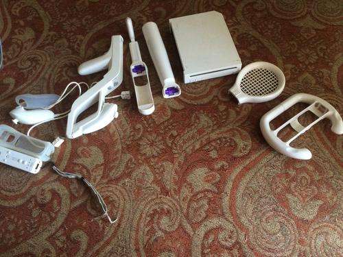 Wii console, and accessories and one game