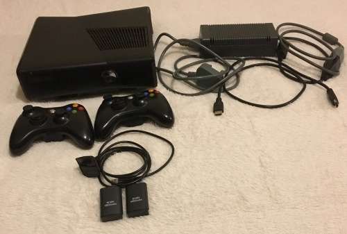XBox 360 Slim 4gb with 110gb Hdd, 2 Remotes and 15 Games