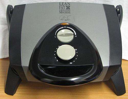 George Foreman LEAN MEAN FAT REDUCING GRILLING MACHINE - Model GR28SIL