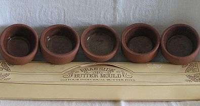 BUTTER MOULDS, Stoneware - 4 individual Butter Pots, plus 1 with a stamp on the bottom