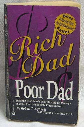 RICH DAD POOR DAD, by Robert T Kiyosaki - Paperback 2001 - ISBN 0446611093
