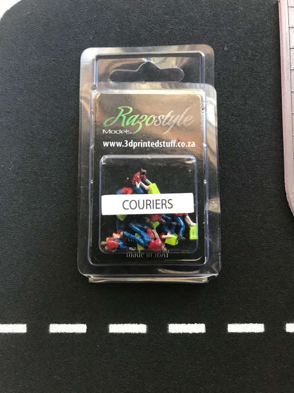 Set of 9 HO Scale Courier figures