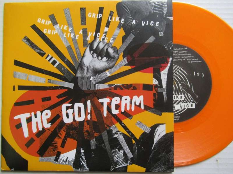 THE GO TEAM - GRIP LIKE VICE - 7" UK VG+ /VG+ ORANGE VINYL