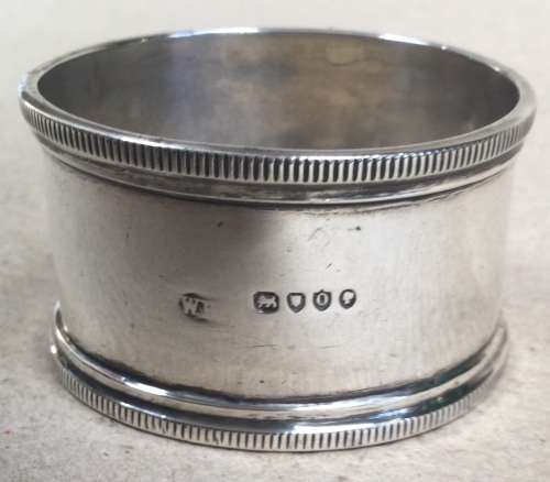 19th Century silver napkin ring 24 grams. No inscription.