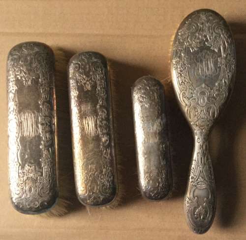 Sterling silver hair & clothes brushes....silver perfect but brush parts no good