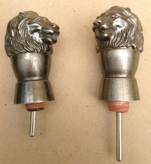 Lion Head pourers.....both for one bid.....postage R23.00