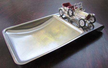 Retro desk tidy with motor car ornament. Approx. 19 L x 2.5 H x 12 cm W