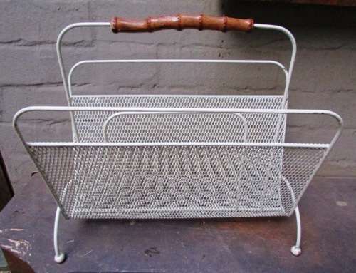 Mid Century Metal with Atomic Ball Feet Magazine Rack Circa 1950's. 40 l x 20 w x 36 cms high