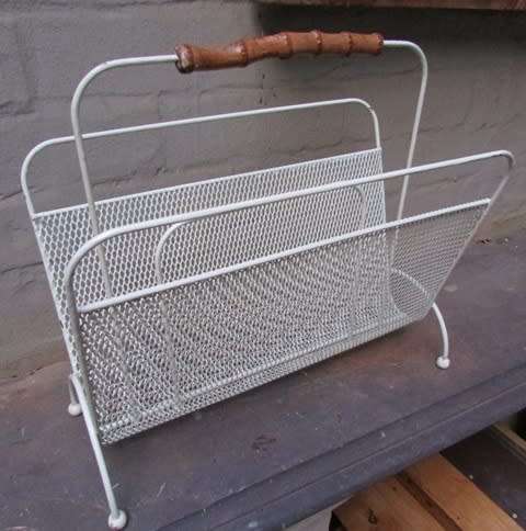Mid Century Metal with Atomic Ball Feet Magazine Rack Circa 1950's. 40 l x 20 w x 36 cms high