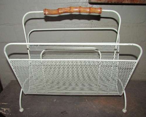 Mid Century Metal with Atomic Ball Feet Magazine Rack Circa 1950's. 40 l x 20 w x 36 cms high