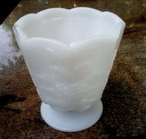 Milk Glass `Grape design` footed vintage vase/ bowl approximately D 12 x H 13 cms