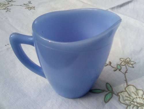 Blue milk glass jug approximately L12 x W8 x H11 cms vintage