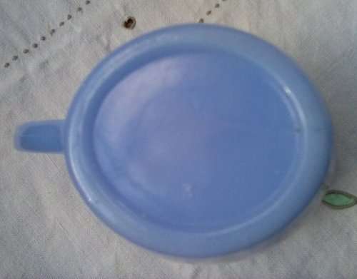 Blue milk glass jug approximately L12 x W8 x H11 cms vintage