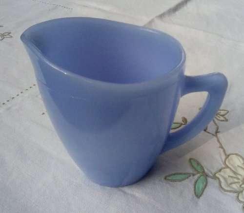 Blue milk glass jug approximately L12 x W8 x H11 cms vintage