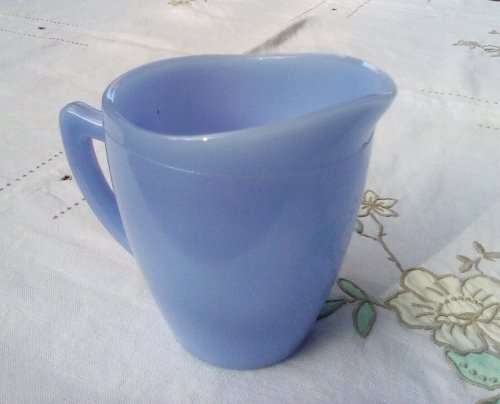 Blue milk glass jug approximately L12 x W8 x H11 cms vintage