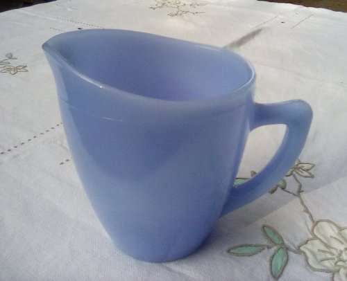 Blue milk glass jug approximately L12 x W8 x H11 cms vintage